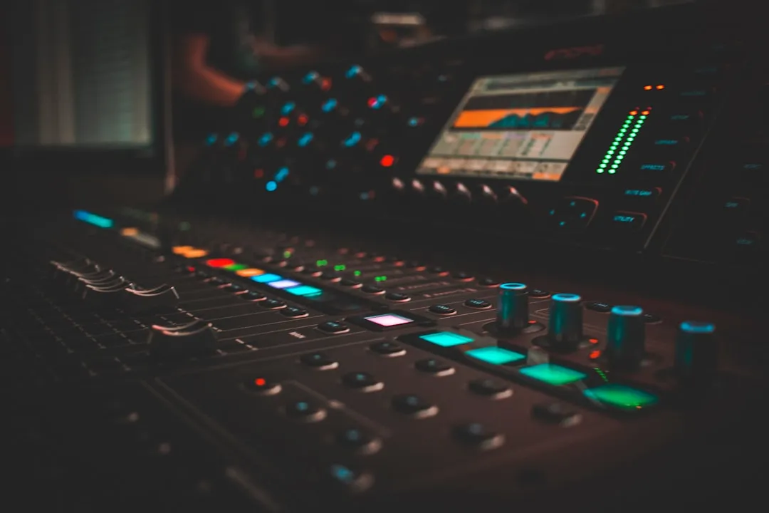 MUSIC SUBMISSION 1 Audio mixing board in a recording studio, representing Hoodz Radio's music submission process